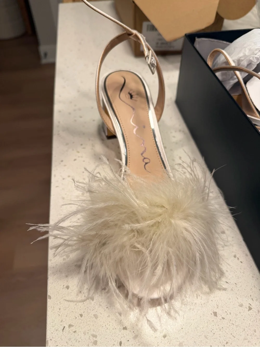 Nina Bev feathered heels